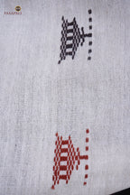 Aalraga pallu close-up — macha fish and pharsa axe motifs, authentic Kotpad textile, Pasapali Odisha