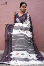 Aalraga Kotpad handloom saree drape view — off-white cotton with vegetable dyed brown border by Pasapali