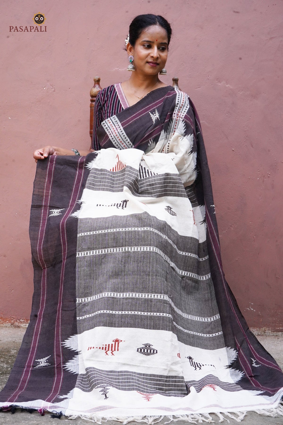 Aalraga Kotpad handloom saree drape view — off-white cotton with vegetable dyed brown border by Pasapali
