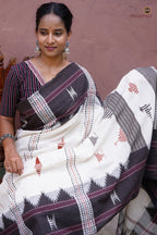 Aalraga Kotpad saree motif detail — pharsa axe and macha fish woven in extra-weft on handspun cotton, Odisha