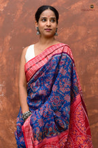 Akshaya Sambalpuri Bandha saree folded view — blue and red mercerized cotton handloom from Pasapali Odisha