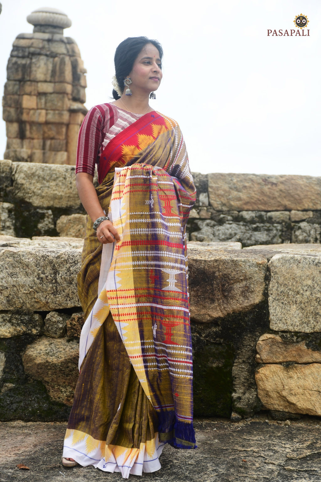 Texture close-up of Amalaki — nubby Tussar Cotton Silk surface from aal bark natural dye, Kotpad handloom Odisha