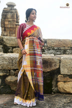 Texture close-up of Amalaki — nubby Tussar Cotton Silk surface from aal bark natural dye, Kotpad handloom Odisha