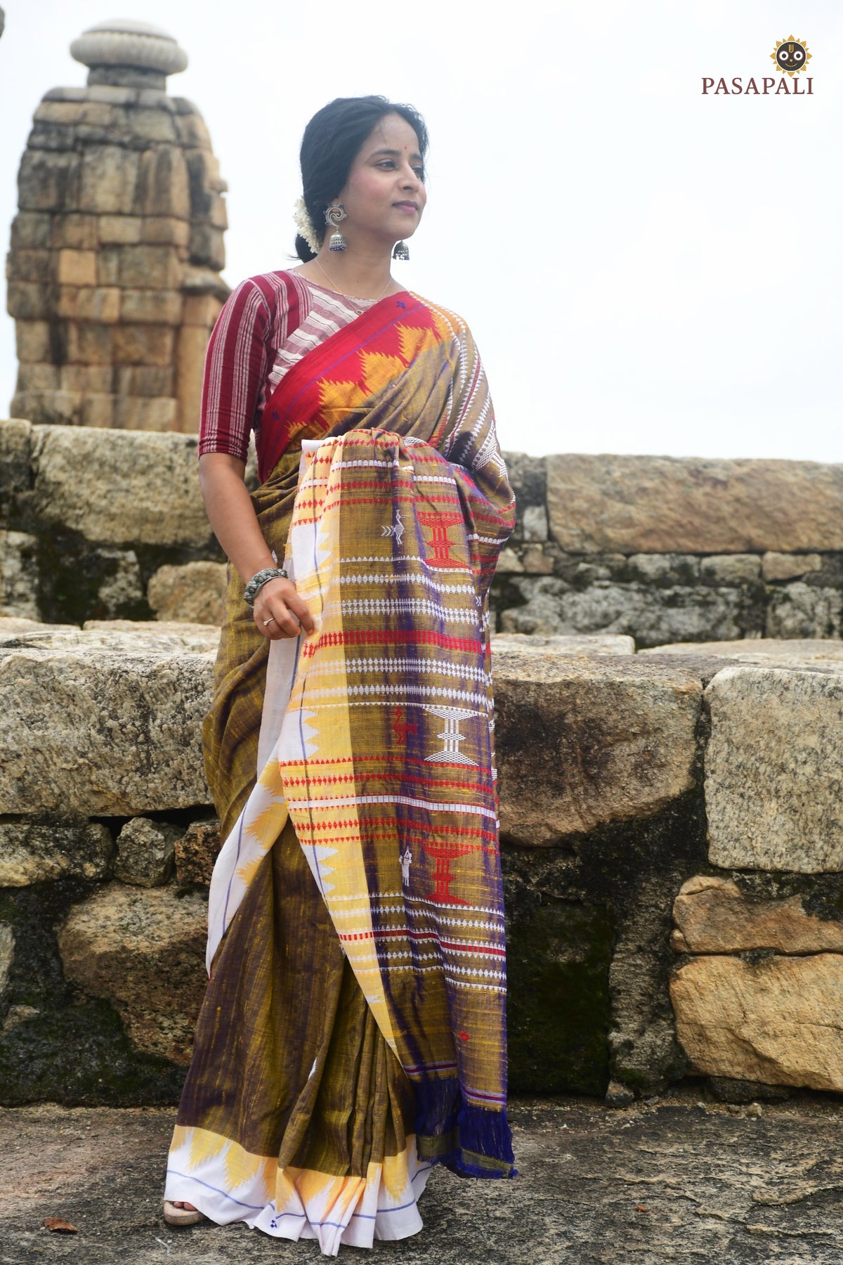 Texture close-up of Amalaki — nubby Tussar Cotton Silk surface from aal bark natural dye, Kotpad handloom Odisha