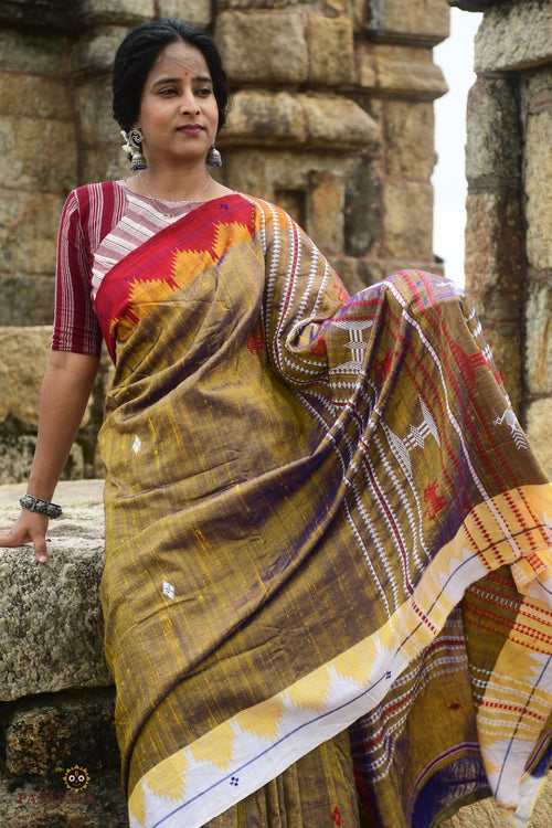 Amalaki Kotpad saree folded — golden and red natural dyed Tussar Cotton Silk, GI certified Kotpad textile Pasapali