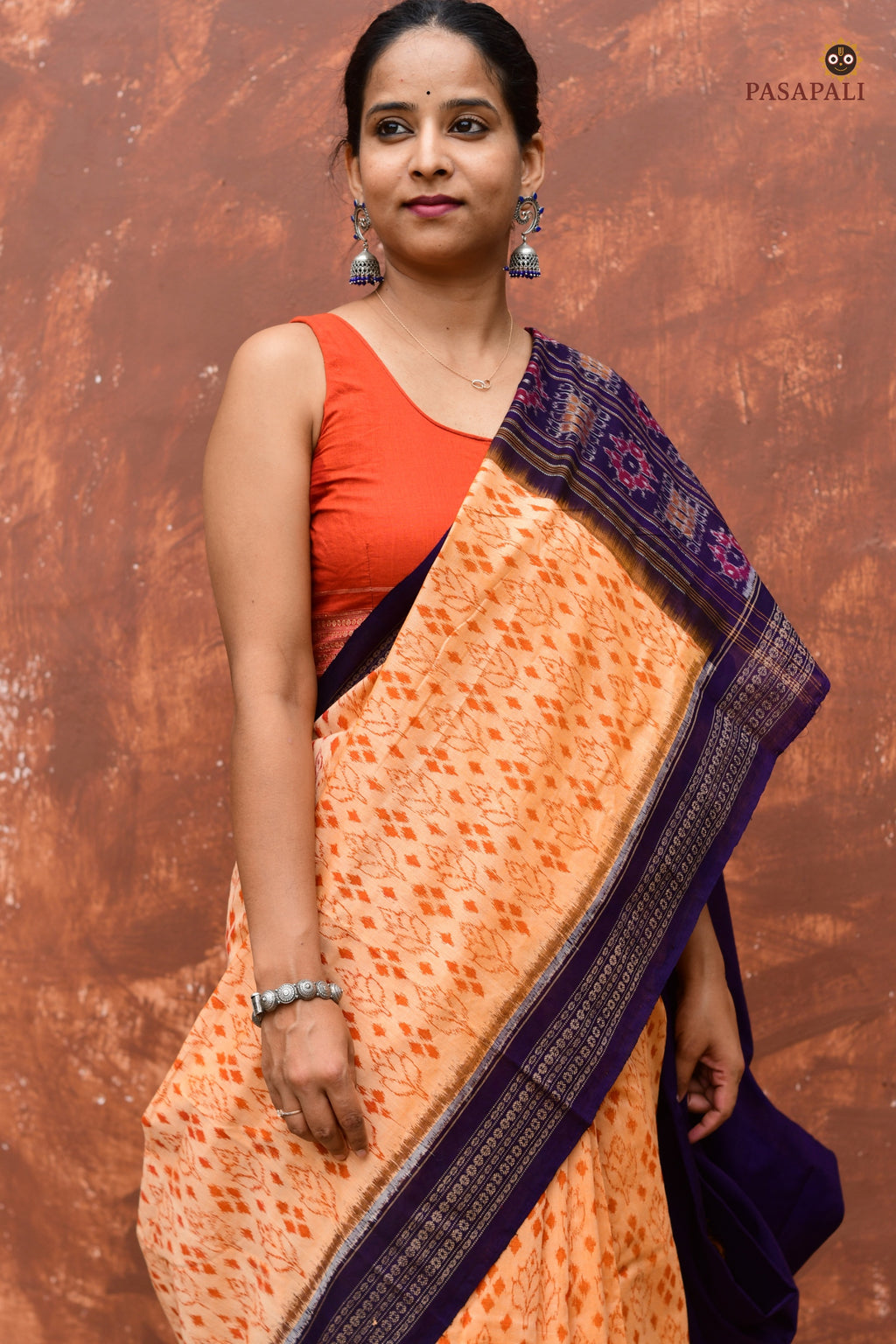 Anasuya Apricot Beige Sambalpuri cotton saree by Pasapali — front drape showing triangular Leaf buta body arrangement.