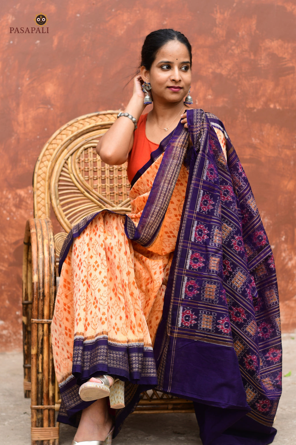 Anasuya Sambalpuri Bandha saree by Pasapali — Rudraksha motif border close-up in Apricot Beige and Blue.