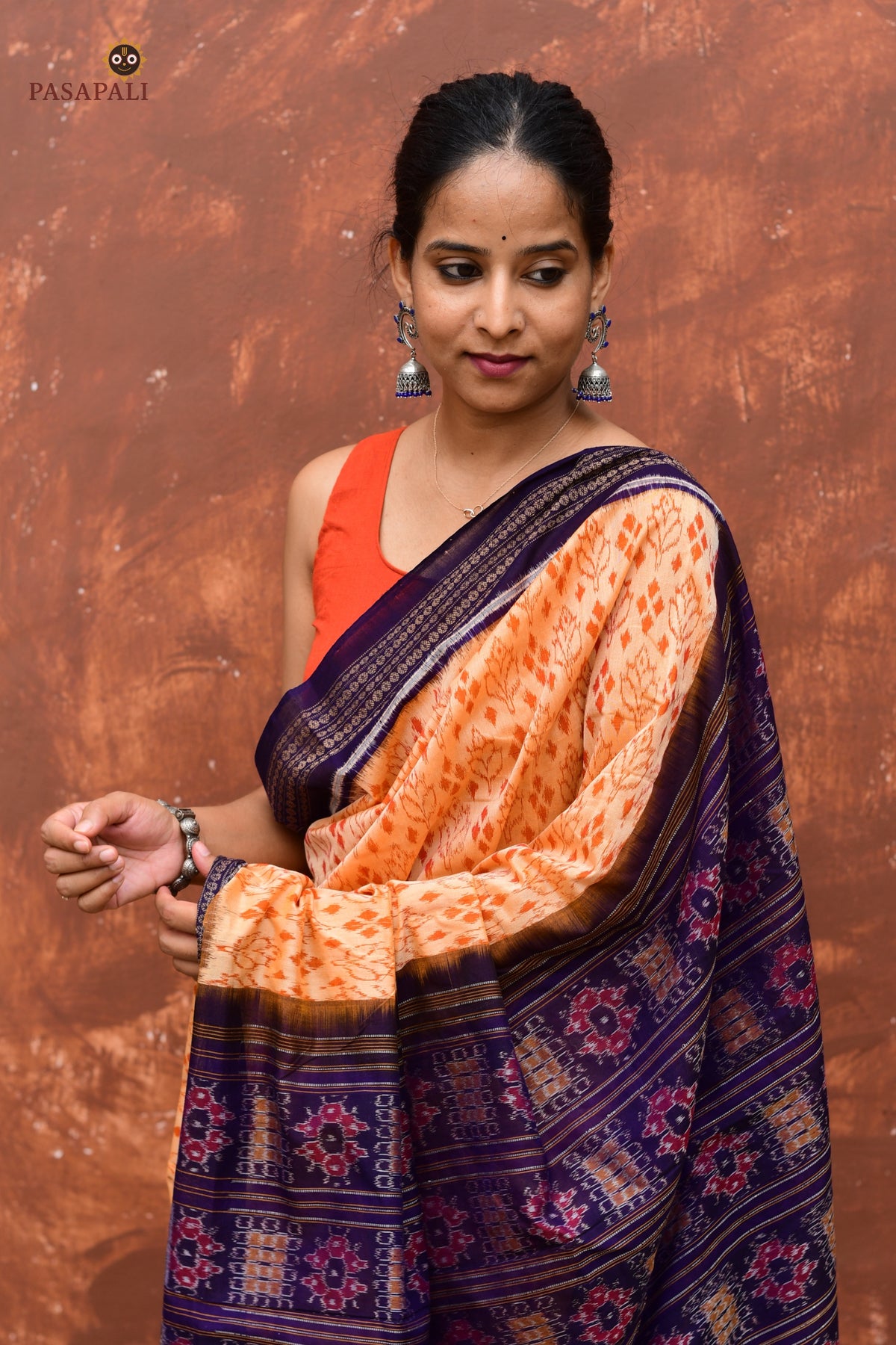 Anasuya Sambalpuri handloom saree by Pasapali — draped view highlighting double ikat precision across warp and weft.