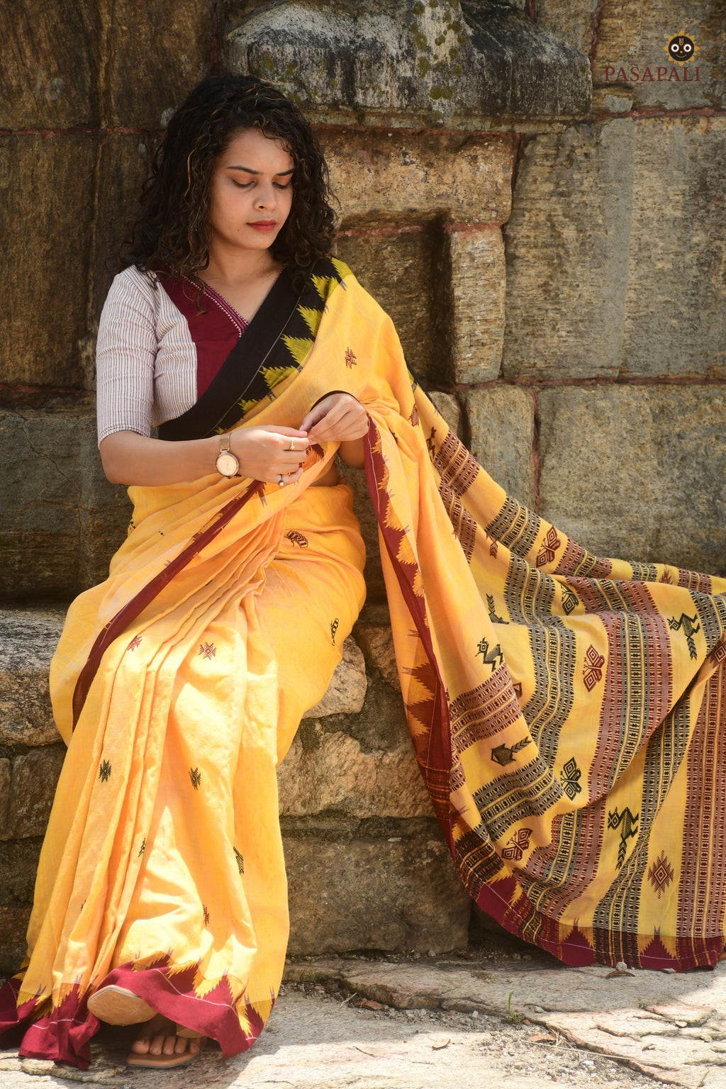Arunima Kotpad saree pharsa axe motif detail — tribal extra-weft weave on natural dyed Tussar Cotton Silk ground