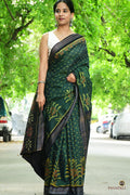 Full view of deep green Sambalpuri mercerized cotton saree with striped buta body and yellow flower at hem, Pasapali.