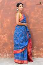 Barshika Blue Sambalpuri Bandha mercerized cotton saree by Pasapali — full hero view with red pallu and mayur motif