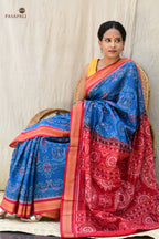 Barshika Blue Sambalpuri cotton saree neatly folded — Rudraksha border and red pallu visible, Pasapali handloom