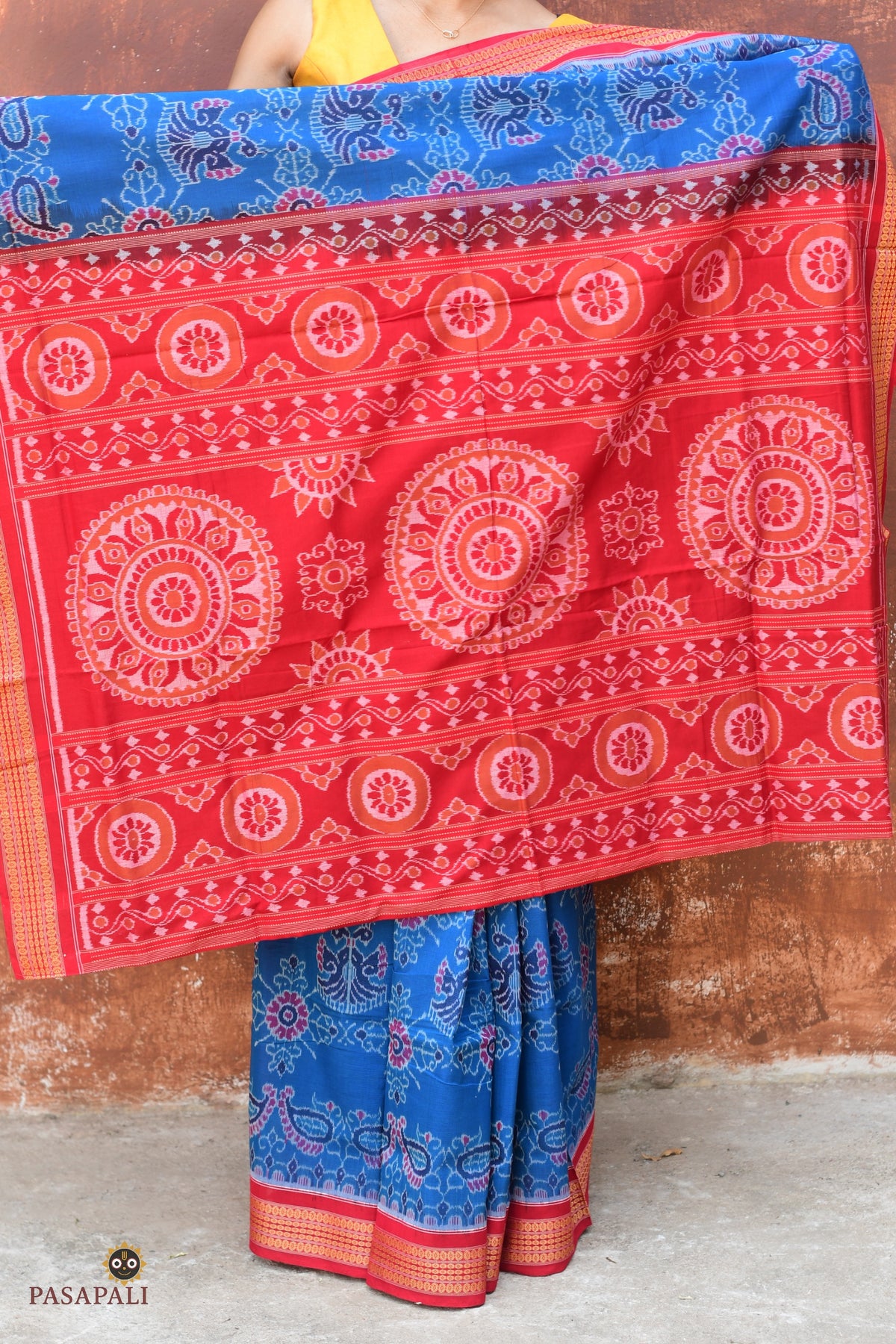 Mayur peacock motif detail on Barshika Sambalpuri cotton saree — Bandha ikat resist-dyed by Bhulia weavers Odisha