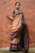 Basundhara Sambalpuri cotton saree draped front view — black Pasapali border with kumbha and fish motifs in light brown mercerized cotton