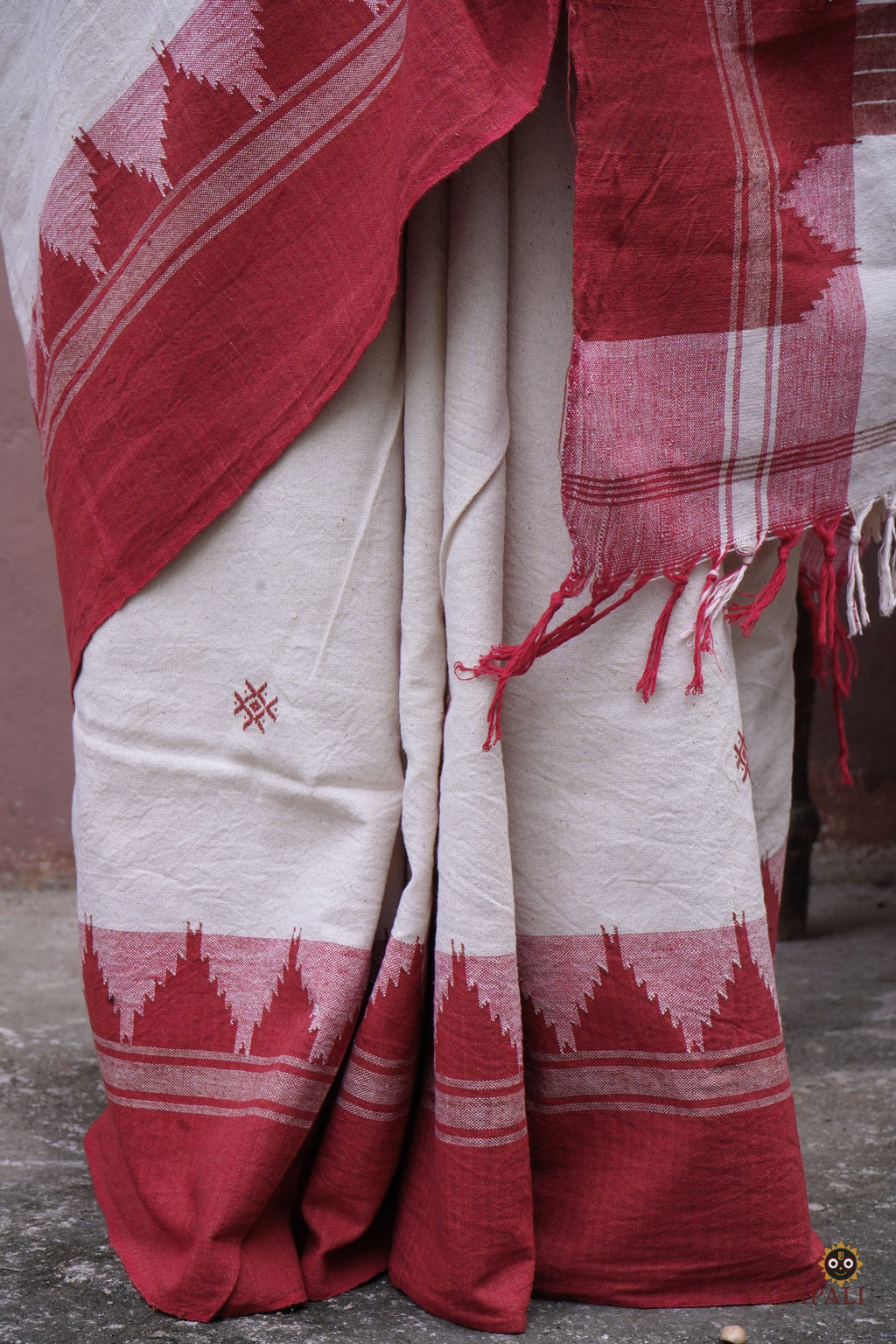 Bhoomi Kotpad natural dye cotton saree — front drape view showing off-white body with macha and pharsa motifs