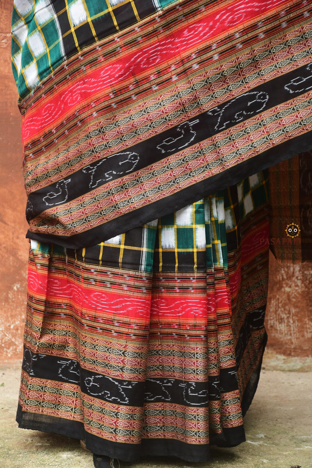 Folded Bichitrapuri Sambalpuri cotton saree — green black double ikat, Bhulia weavers Odisha