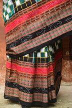 Folded Bichitrapuri Sambalpuri cotton saree — green black double ikat, Bhulia weavers Odisha