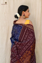 Load image into Gallery viewer, Close-up of Rudraksha motif border on blue Sambalpuri Bandha mercerized cotton saree, Pasapali
