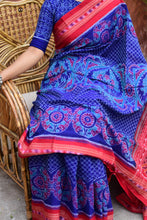 Load image into Gallery viewer, Peacock motif detail on Charulata Sambalpuri Bandha saree — double ikat Bandhakala technique, Odisha handloom.
