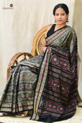 Close-up of fish motif border on Chitrangada grey Sambalpuri Bandha cotton saree, woven by Bhulia weavers, Pasapali