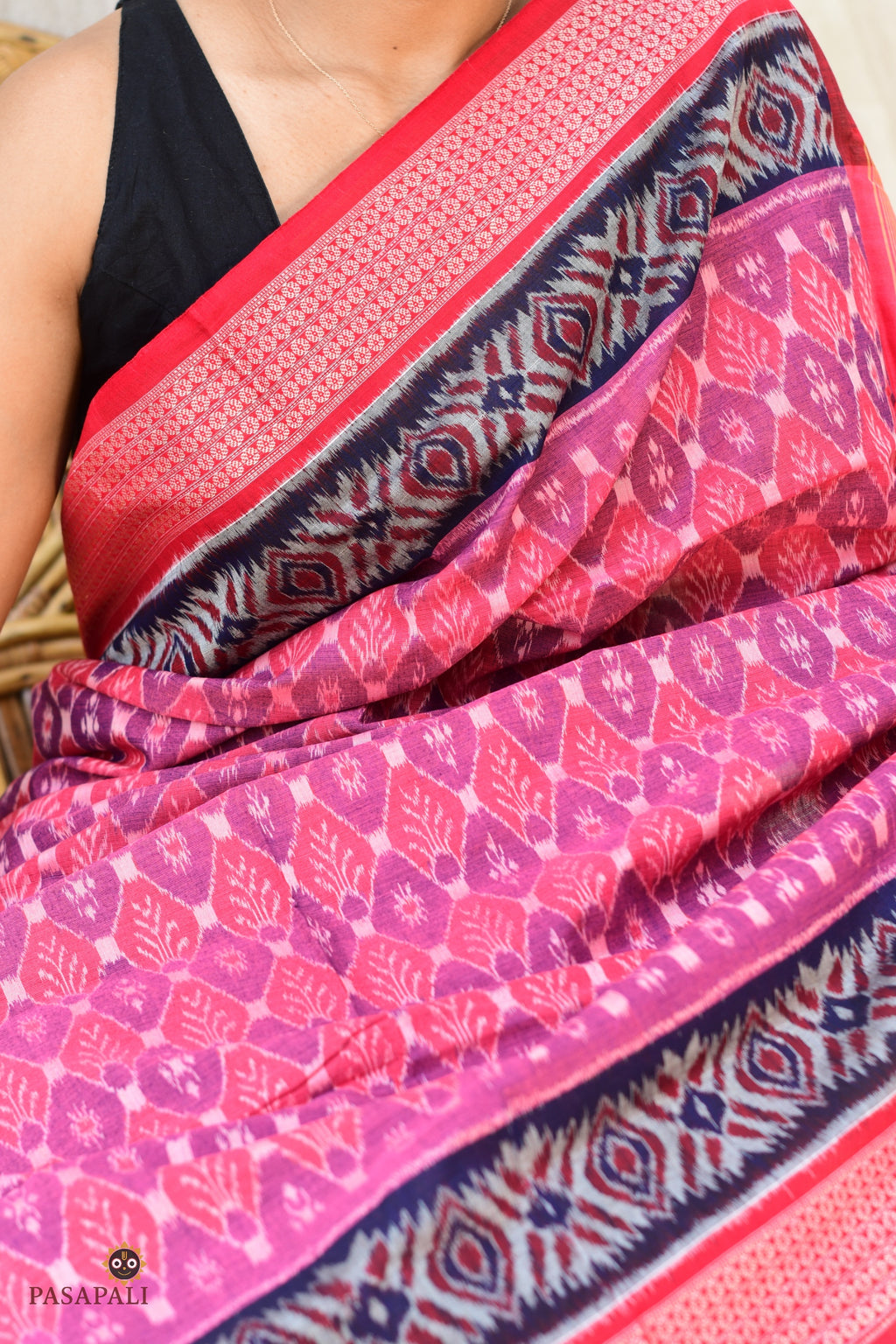 Front drape of Damayanti authentic Sambalpuri cotton saree — Bandhakala ikat weave in pink, Pasapali Odisha