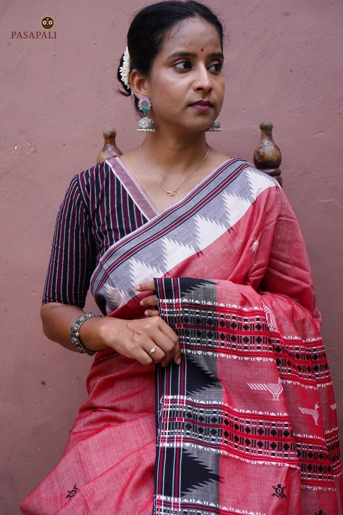 Dharani Kotpad handloom saree draped front — dual shade natural dye, tribal motifs, Government Handloom Mark