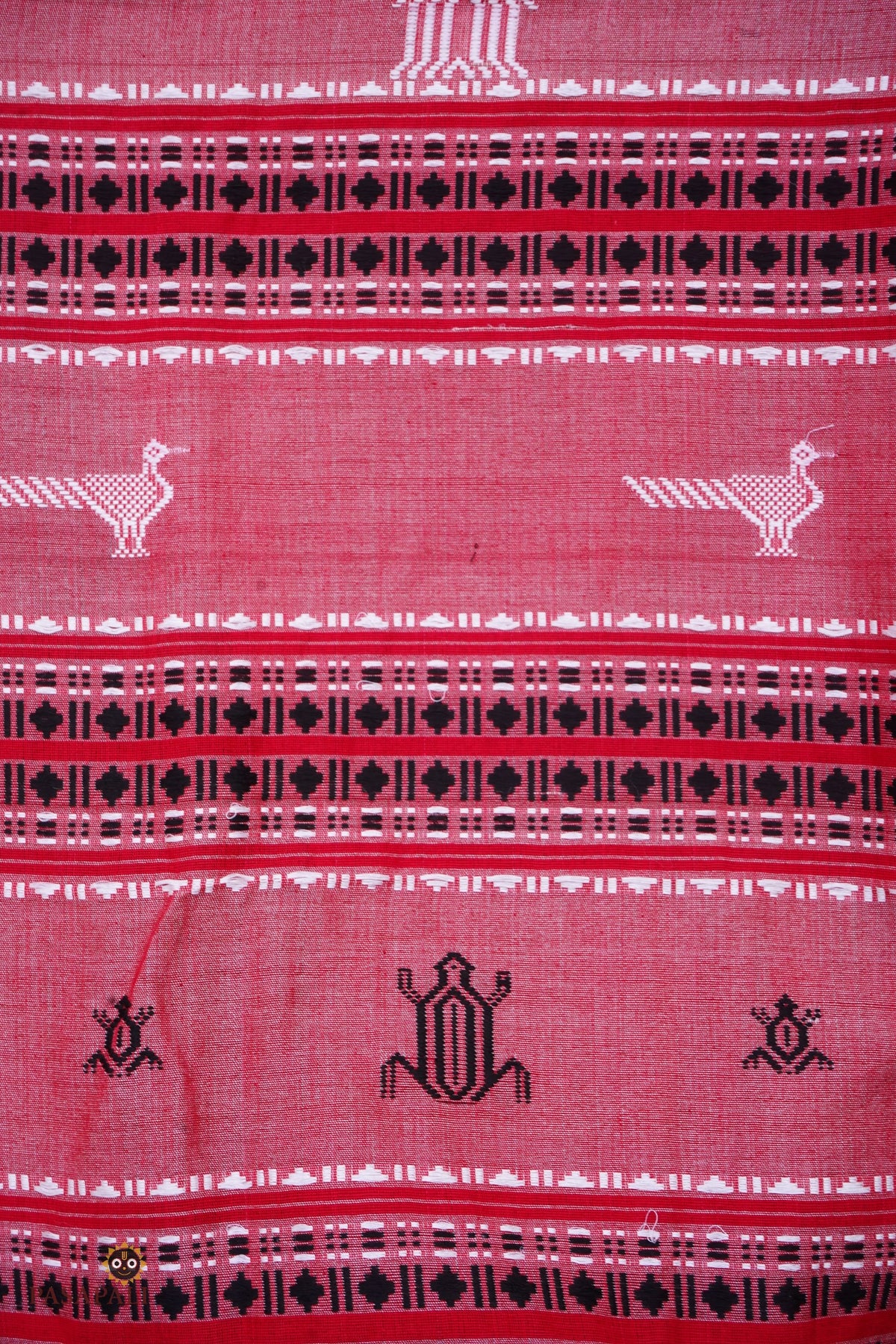 Dharani Kotpad saree body detail — pharsa axe motif woven extra-weft, vegetable dyed earthy dual shade fabric