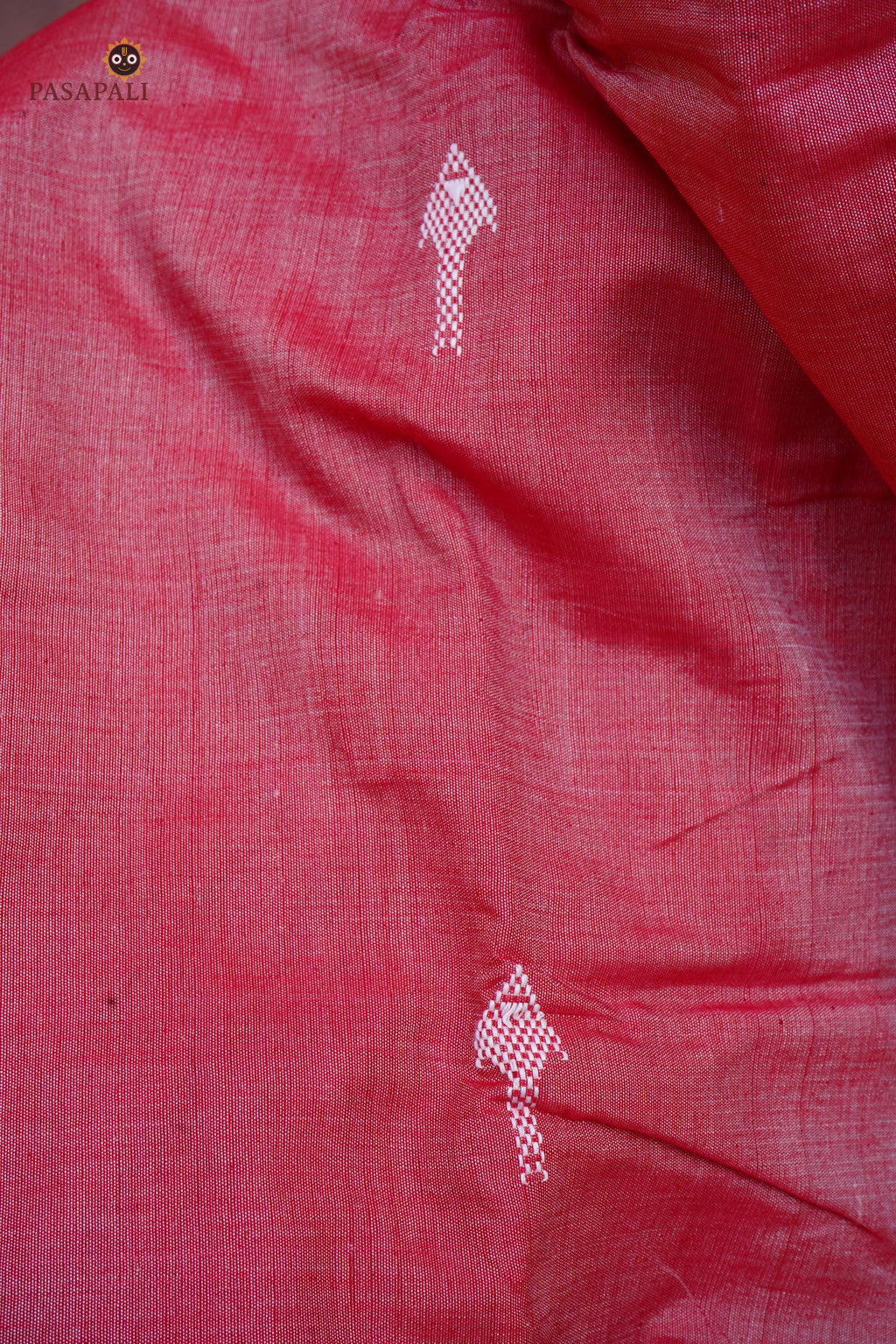 Dharani Kotpad saree motif detail — macha fish pharsa axe tribal symbols, extra-weft weave, aal bark colour
