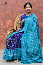 Draupadi Sambalpuri cotton saree folded — blue teal Bandha double ikat, kumbha motif border visible