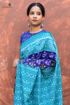 Ikat motif detail on Draupadi — warp and weft flower alignment, Sambalpuri Bandhakala technique