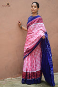 Hemavati Pink Sambalpuri cotton saree — front drape view showing flower buta body and maroon-blue paan patri border