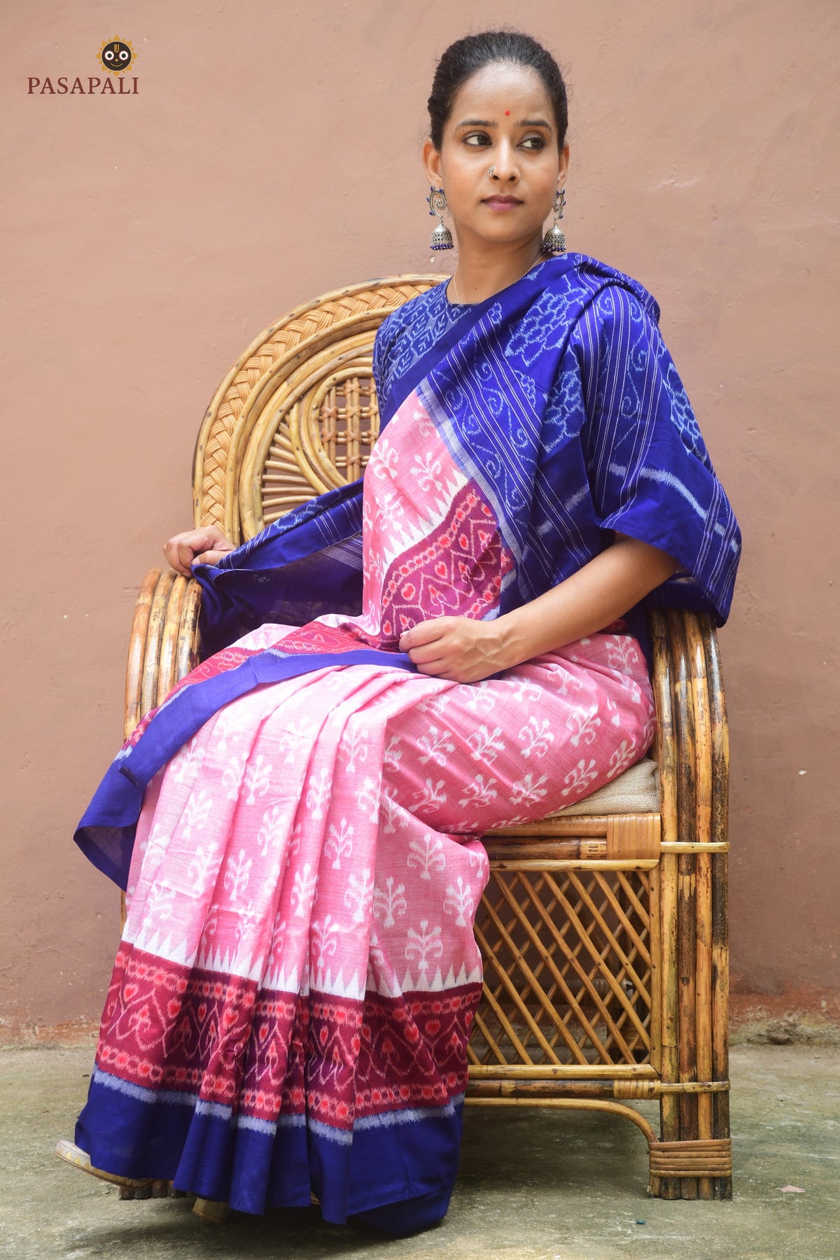 Hemavati Pink Sambalpuri cotton saree — folded saree detail with paan patri border and phula pallu visible