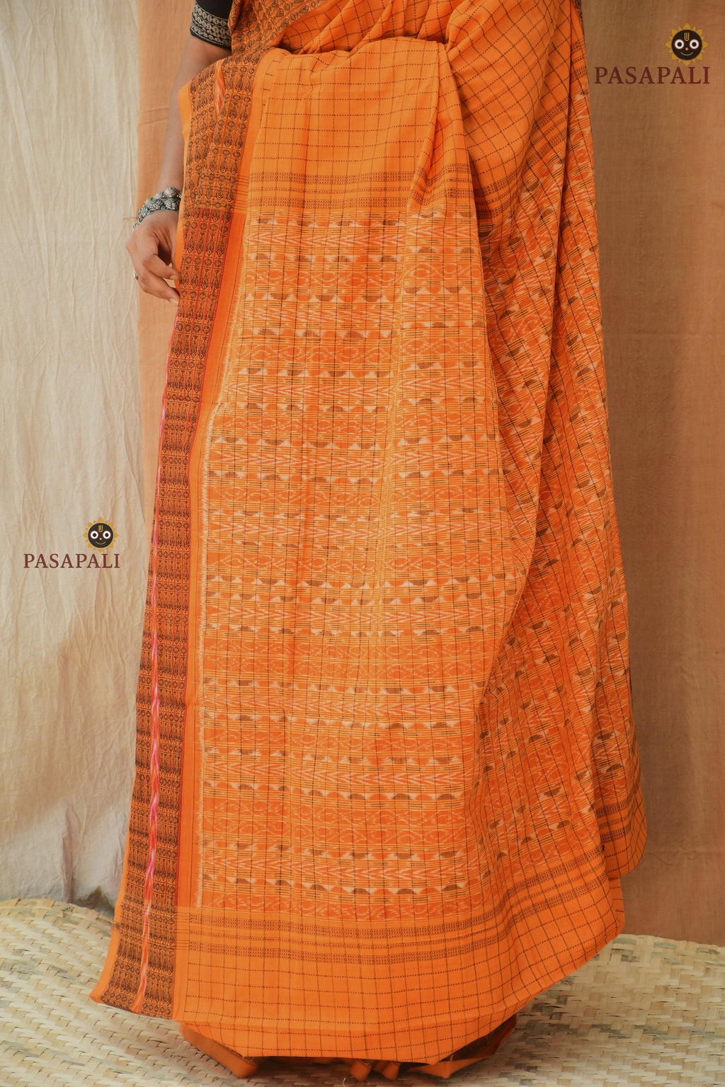 Kanakrekha saree drape front detail — daanti body with jala checks, Sambalpuri Bandha