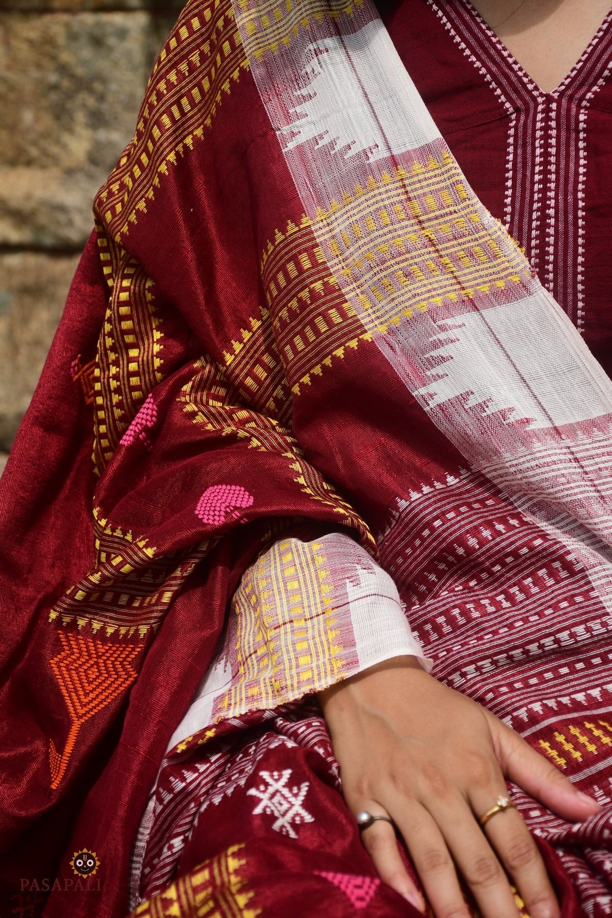 Kanan Kotpad saree pallu spread — intricate tribal macha fish pharsa axe motifs, aal bark dye, Pasapali