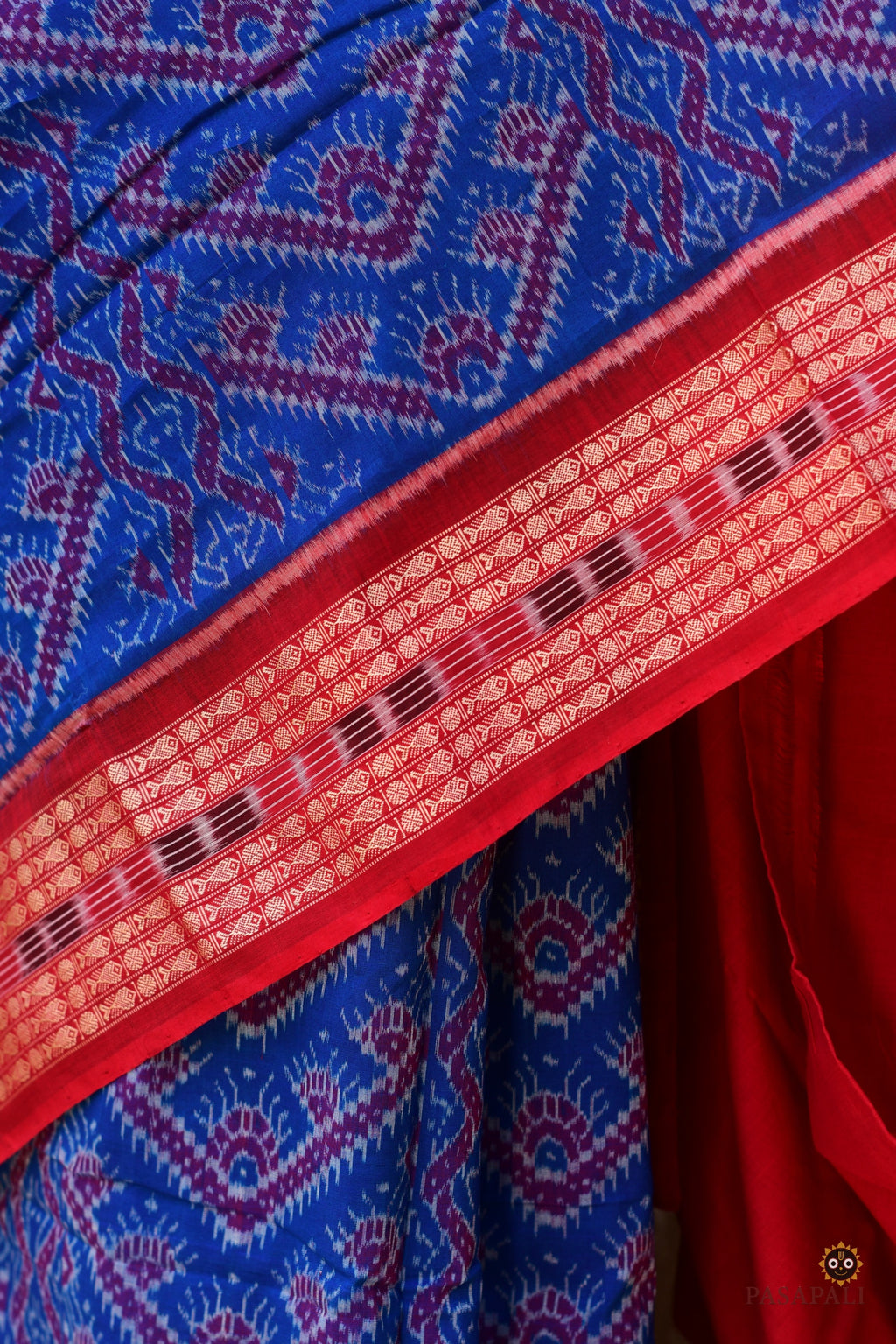 Hero view of Kaumudi Sambalpuri Handloom cotton saree by Pasapali in blue with red fish motif border and floral pallu