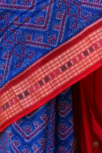 Hero view of Kaumudi Sambalpuri Handloom cotton saree by Pasapali in blue with red fish motif border and floral pallu
