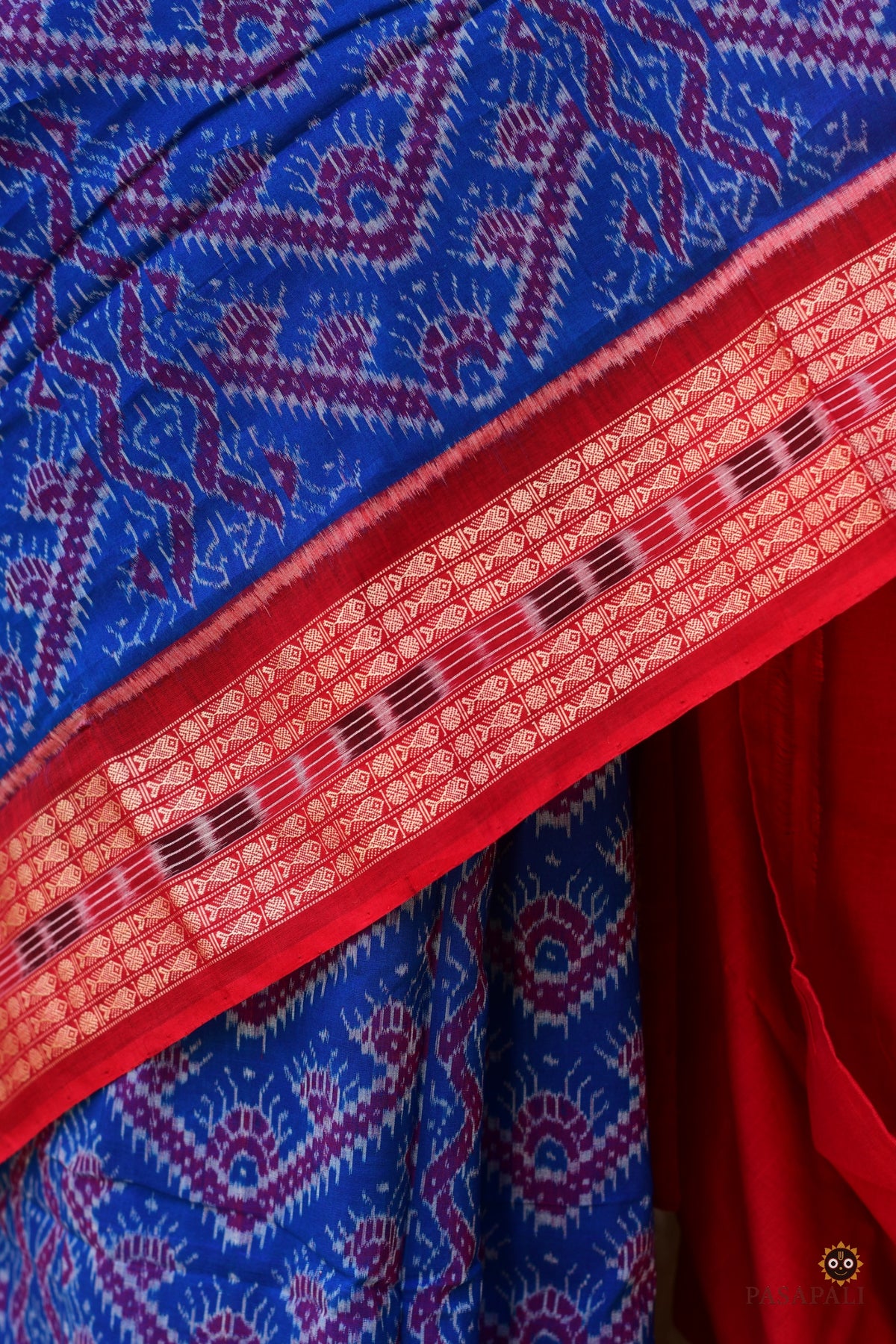 Hero view of Kaumudi Sambalpuri Handloom cotton saree by Pasapali in blue with red fish motif border and floral pallu