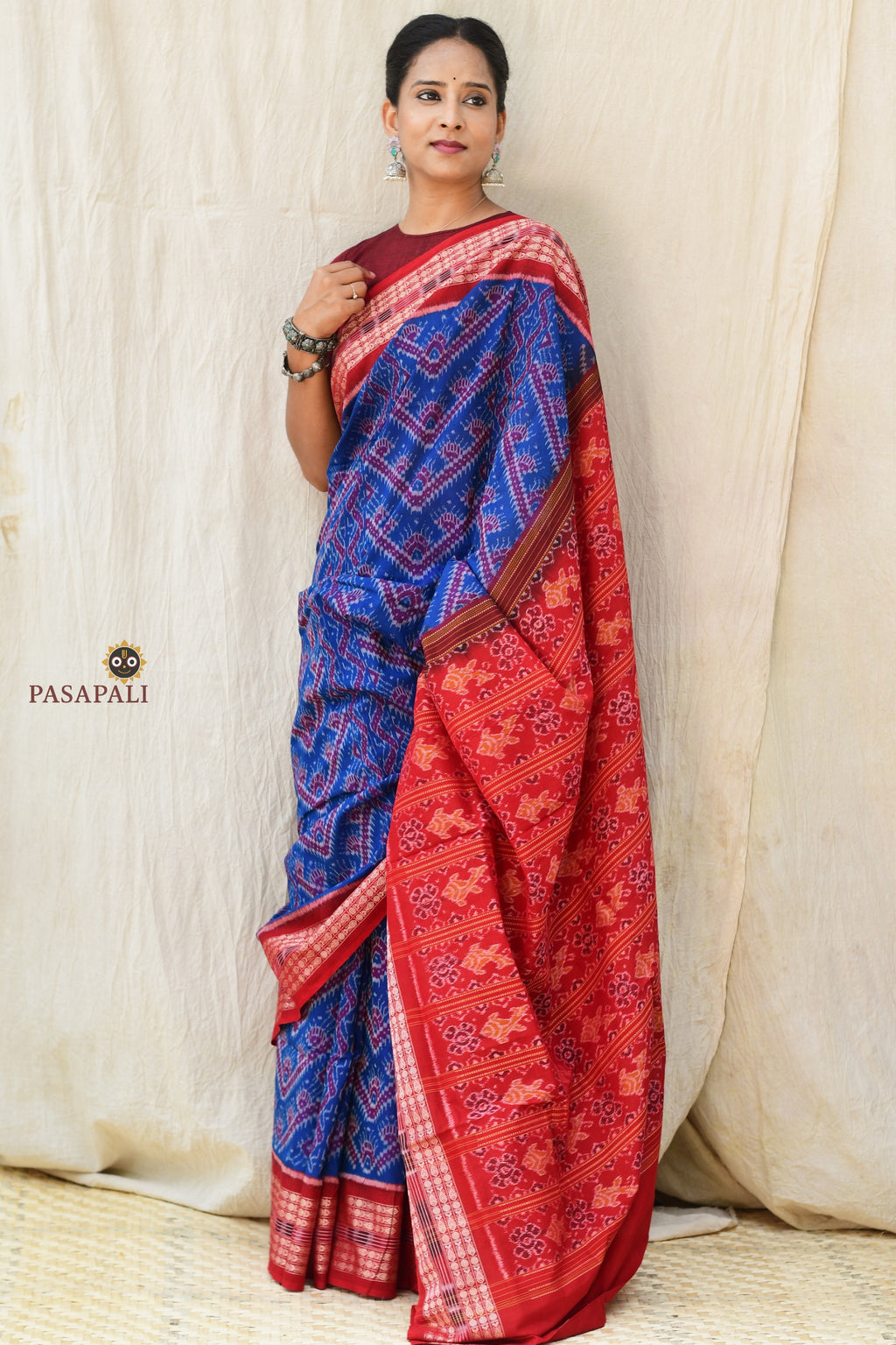 Mercerized cotton texture detail of Kaumudi Blue Sambalpuri Bandha saree — warp and weft thread alignment visible