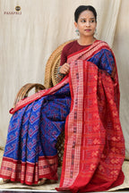 Folded view of Kaumudi Blue Sambalpuri Bandha mercerized cotton saree showing GI certified handloom weave layers