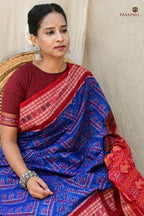 Handloom drape view of Kaumudi Sambalpuri cotton saree by Pasapali — chevron body with fish border in motion