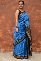 Kaushalya Blue Sambalpuri Bandha mercerized cotton saree by Pasapali — full hero view with Laxmi yantra pallu and ikat border