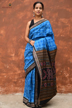 Kaushalya Sambalpuri cotton saree draped front view — Blue and Black Bandha ikat with flower motifs on body by Pasapali