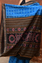 Kaushalya Blue Sambalpuri Bandha saree folded flat — Black and Blue mercerized cotton handloom, Pasapali Odisha