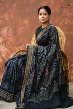 Load image into Gallery viewer, Krishnakali GI certified Sambalpuri cotton saree in black — Bandha double ikat with fish border, Pasapali Odisha
