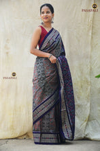 Load image into Gallery viewer, Kusumalata grey Sambalpuri Bandha mercerized cotton saree by Pasapali — full hero view showing Phula jala body and fish border
