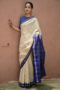 Kusumavali off-white Sambalpuri Bandha mercerized cotton saree by Pasapali — full hero view with blue ek phulia border and phula pallu