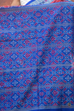 Load image into Gallery viewer, Kusumita Red Sambalpuri cotton saree — front drape view showing double ikat Bandha weave and Rudraksha border
