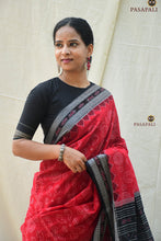 Load image into Gallery viewer, Lakshmiyantra Sambalpuri Bandha saree Rudraksha border close-up — black on red mercerized cotton
