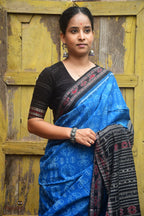 Front drape of Laxmi blue Sambalpuri cotton saree showing Lakshmi yantra body motif — Pasapali Bandha weave