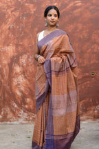 Lekhika Sambalpuri cotton saree draped front view — Bandha double ikat checks in light brown and navy blue, Pasapali